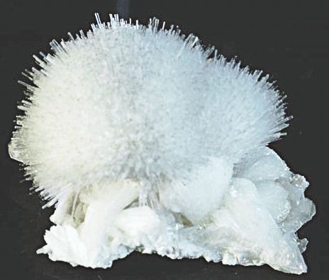 Mesolite  acicular crystals in a radial cluster on Stilbite