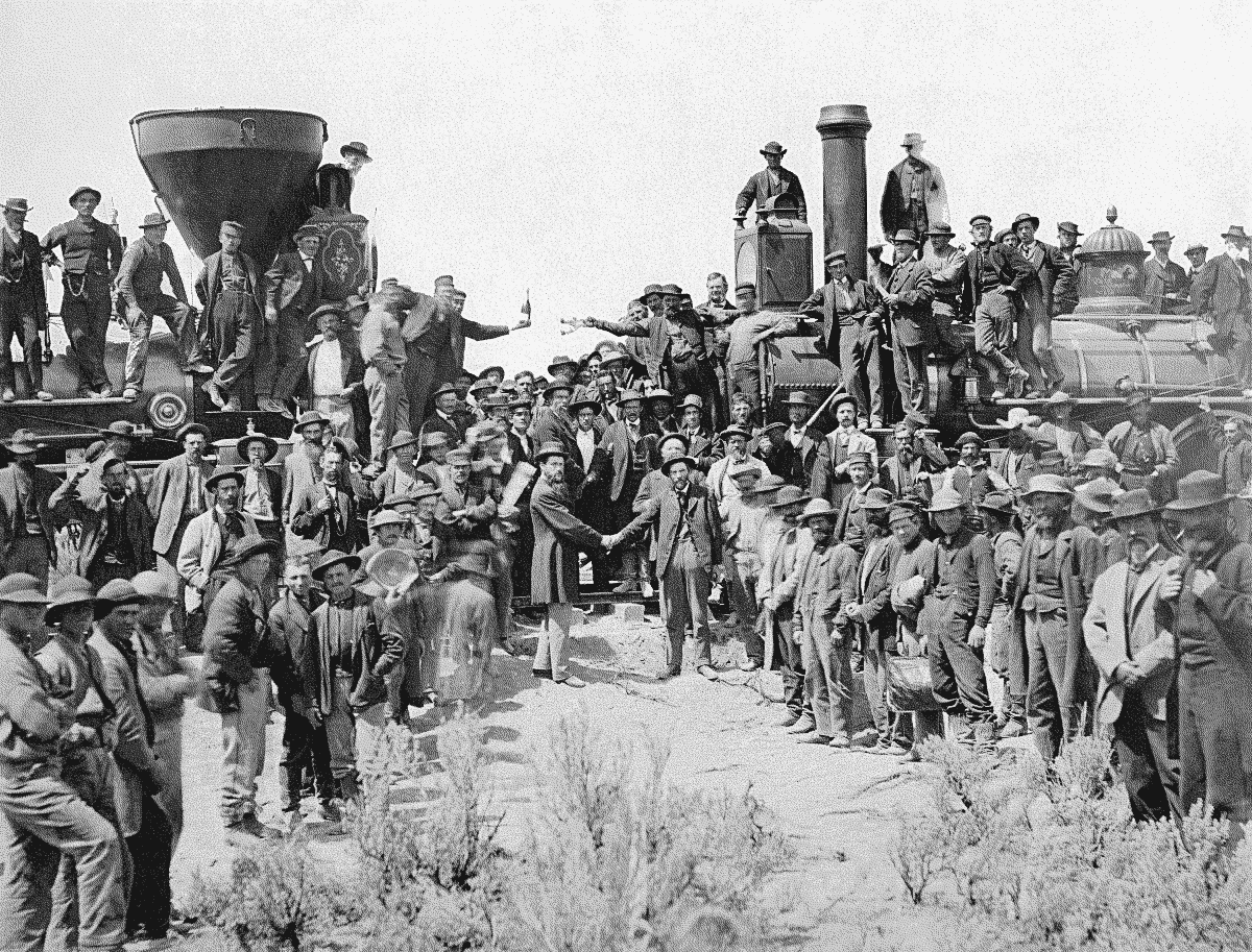 Transcontinental Railroad East and West Shaking hands