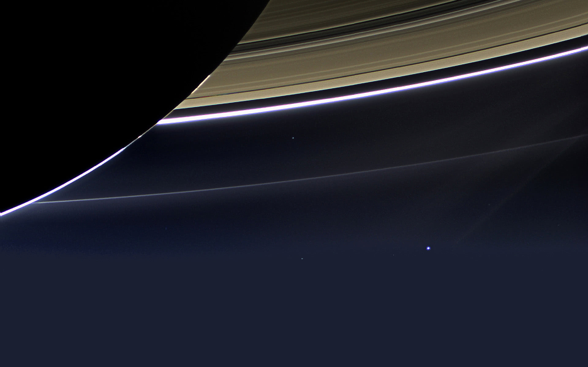 Earth Moon system seen from Saturn wallpaper
